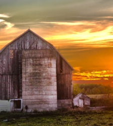 Image of barn at sunset